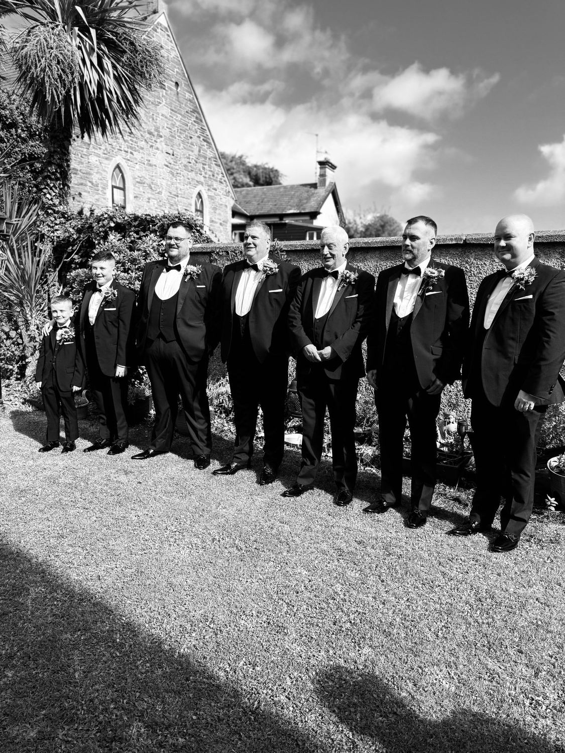 The wedding party lined up outside the church before the ceremony.